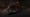 The image depicts the space station known as The Nexus from the Mass Effect series from a side view in space.